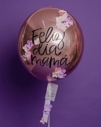 a balloon that says felida mama on a purple background