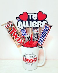 a coffee mug with a tequila mug and candy bars